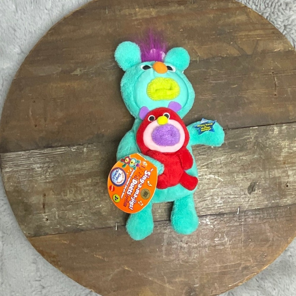 Mattel Sing-a-ma-jigs Duets Teal Red Sings Bingo Interactive Musical Plush Toy